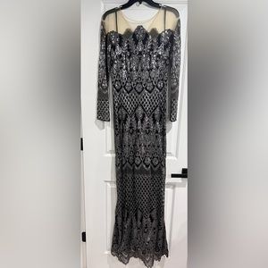 Fully embellished black gown by Tadashi Shoji